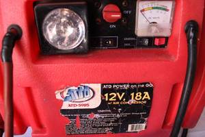 lot 69 image: ATD Power on the Go Battery Charger wAir Compressor