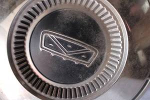 lot 109 image: Lot of Vintage Hubcaps