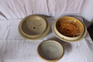 lot 167 image: Three Crock Lids, Red Wing()