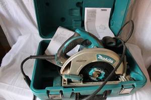 lot 66 image: Makita Electric Circular Saw