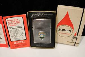 lot 28 image: 2 Vintage Zippo Lighters wCases