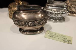 lot 32 image: Four Vinatge Table Lighters