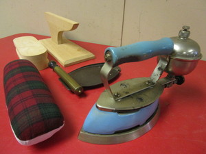 lot 114 image: VINTAGE COLEMAN GAS IRON, WITH PUMP AND REST PLATE, IRONING ACCESSORIES
