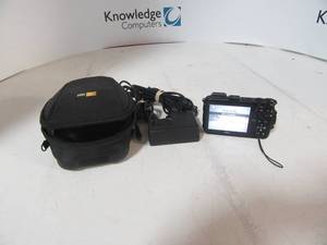 lot 47 image: Nikon Coolpix Digital Camera with caseaccessories