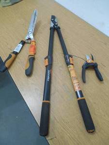 lot 133 image: (3) FISKARS TRIMMING  PRUNING SHEARS.