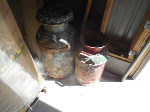 lot 149 image: (2) OLD MILK CANS