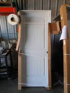 lot 51 image: 34 in. x 80 in. Santa Fe White Painted Left-Hand Smooth Solid Core Molded Composite MDF Single Prehung Interior Door
