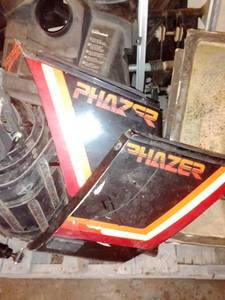 lot 80 image: Phazer Snowmobile frame, panels, 2 tracks, cowl. seat & more.