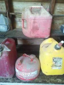 lot 87 image: 4 fuel cans.