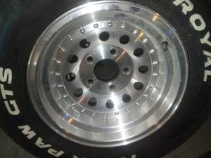 lot 118 image: 4 Aluminum American Racing Rims. Excellent condition.