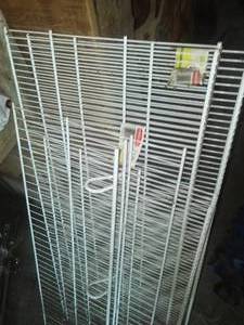 lot 120 image: NEW 4 Rubbermaid metal shelving. -new.