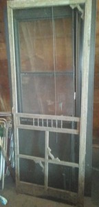 lot 148 image: Wood Screen door (32 in.) & modern screen door (36 in.).