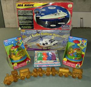 lot 247 image: Toys - Mosty New. Radio controlled boat and helicopter