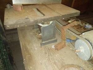 lot 160 image: Vintage table saw & wood stand.