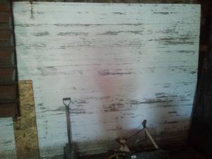 lot 163 image: 2 Quonset woods doors 12 ft 10 ft Tall - all rollers and latch