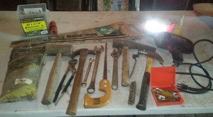 lot 174 image: Tools -drill works, DOT reflective tape. NEW saw.