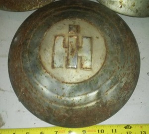 lot 181 image: 3 International Harvester IH Hub Caps, circa 53.