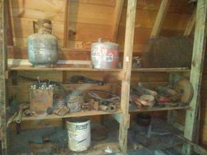 lot 192 image: 7 feet floor to ceiling of auto tractor parts & more.
