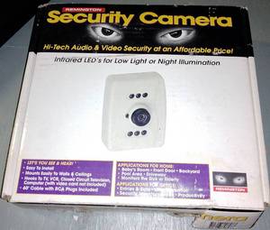 lot 505 image: Black light & Remington security Camera.