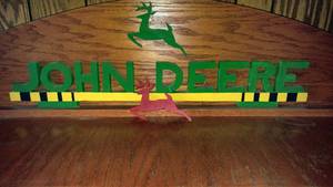 lot 527 image: John Deere Display stand and more.  hand crafted.