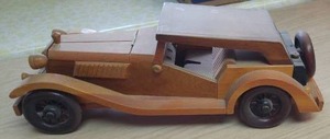 lot 542 image: Wood toy Car with hidden Storage and more.