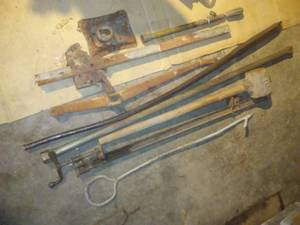 lot 329 image: Misc. - jack, mull, clamp, vintage John Deere handle.
