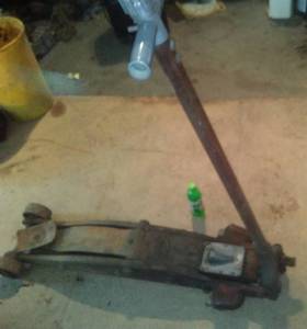 lot 348 image: Blackhawk 1940s Floor Jack with light, excellent.  4 ton. $500 on ebay