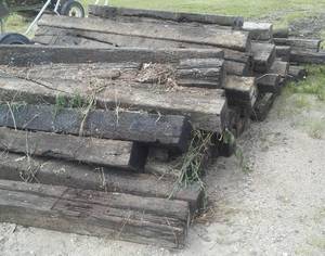lot 390 image: Railroad ties over 8 feet long. at least 30