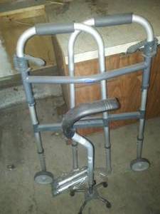 lot 410 image: Adjustable Aluminum walker with wheels & legs,