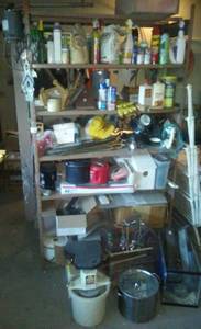 lot 434 image: Metal Mixing Shelf with contents. Ice cream machine, Aquarium, Corelle, Wells Fargo Mugs & much more BIG LOT