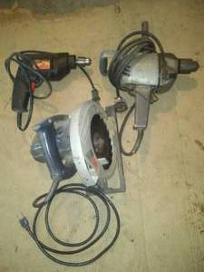 lot 398 image: 2 Drills & circular saw.
