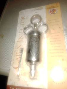 lot 432 image: New in package - Cajun Injector.