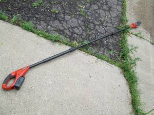 lot 28 image: Black & Decker Cordless Saw With Ba...