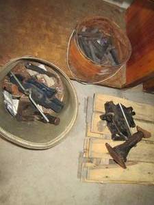 lot 52 image: Bucket Full of Railroad Spikes & Ot...
