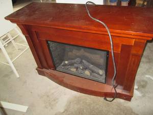 lot 62 image: Electric Fireplace Good Shape Ga...