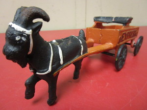 lot 902 image: VINTAGE CAST-IRON GOAT-DRIVEN EXPRESS CART TOY