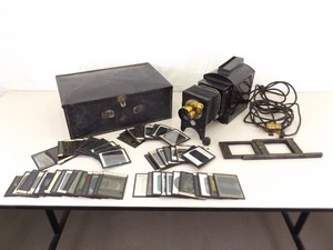 lot 30 image: Antique McIntosh Stereopticon and 50 Colored Glass Magic Lantern Slides