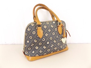 lot 77 image: Authentic DOONEY and BOURKE Monogram Purse