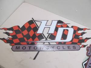 lot 24 image: Harley Davidson advertisement