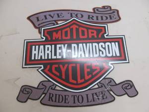 lot 23 image: Harley Davidson advertisement