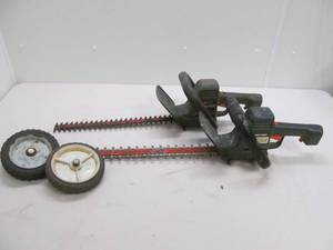 lot 48 image: black n decker hedge trimmers, lawn mower wheels
