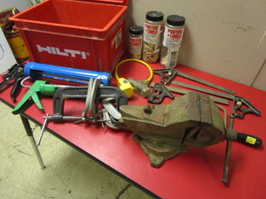 lot 511 image: WOODWORKING SUPPLIES, INCLUDING 4 VICE, CLAMPS, PORTER CABLE BISCUITS, CAULK GUNS, MORE