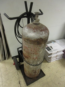 lot 512 image: TANK WITH TORCH AND CART