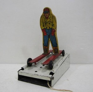 lot 196 image: 1940s Wolverine Ski Jumper Toy