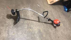 ECHO 21.2 cc Gas 2-Stroke Cycle Curved Shaft Trimmer in good working conditions