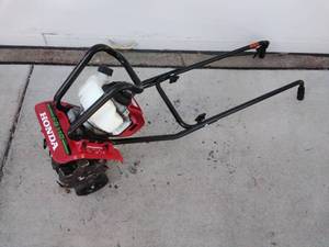 lot 210 image: Honda Tiller