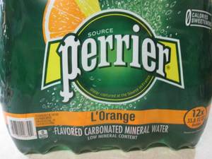 lot 105 image: Perrier LOrange Flavored Carbonate...
