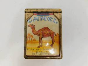 lot 59 image: Vintage Metal Cigarette Case with Unopened Pack of Camels