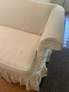 lot 11 image: Petite Ivory Sofa