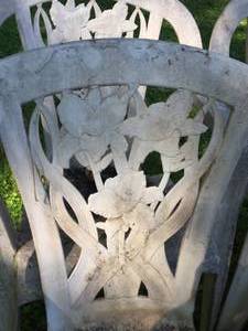 lot 82 image: Two Garden Hose Rollers and Four Resin Stacking Chairs